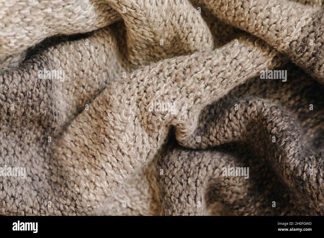 Beige autumn knitting wool texture background Stock Photo