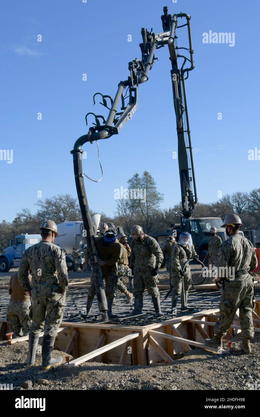 Naval Mobile Construction Battalion 5 based at Port Hueneme, California, constructed a concrete pad at Fort Hunter Liggett’s Training Area 10 during two weeks in February 2021. FHL purchased eight truckloads of concrete from a Paso Robles contractor for this project. Stock Photo