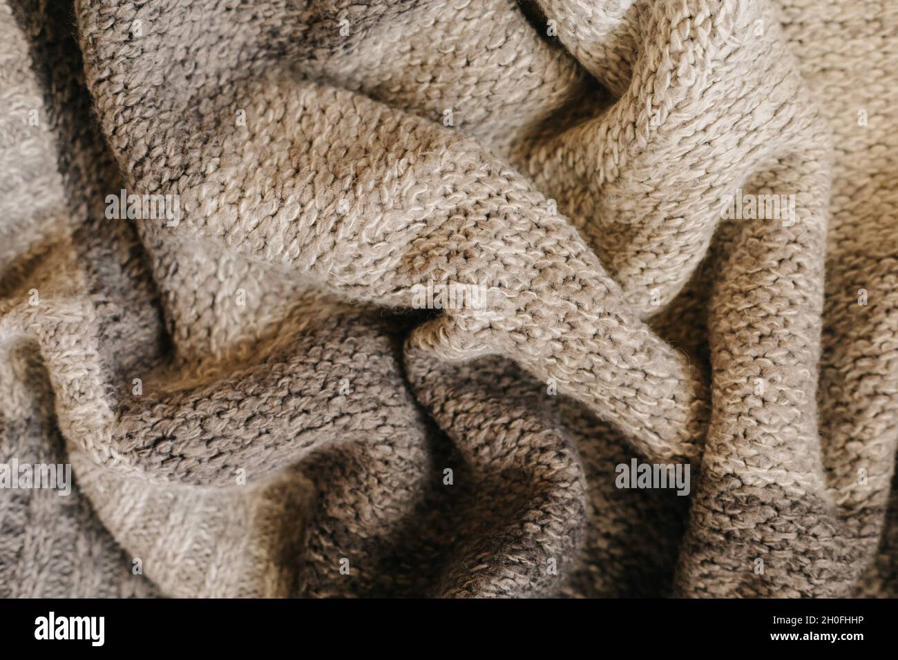 Beige autumn knitting wool texture background Stock Photo
