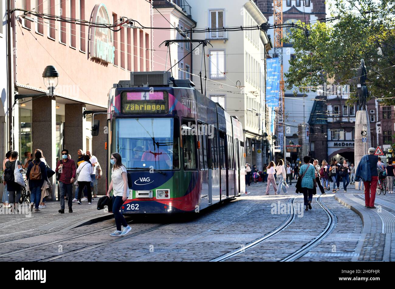 Electric tram on street in Freiburg Germany. Deutschland Stock Photo