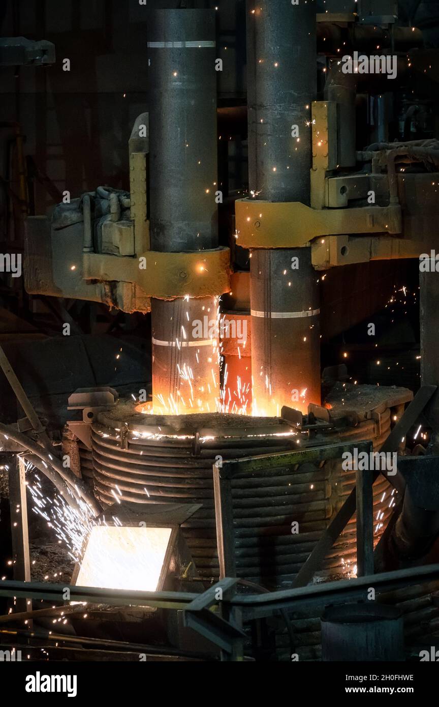 Electric steel furnace, glowing graphite electrodes Stock Photo Alamy