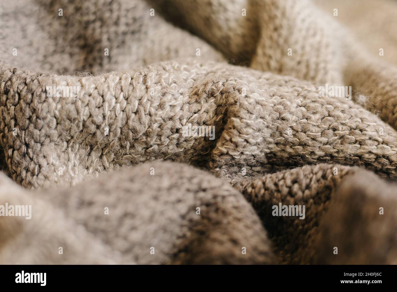 Beige autumn knitting wool texture background Stock Photo