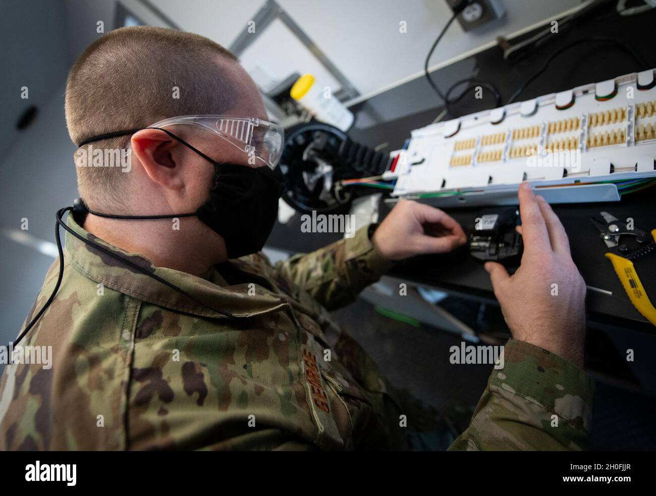 Tech sgt brian george 96th communications squadron prepares to cut