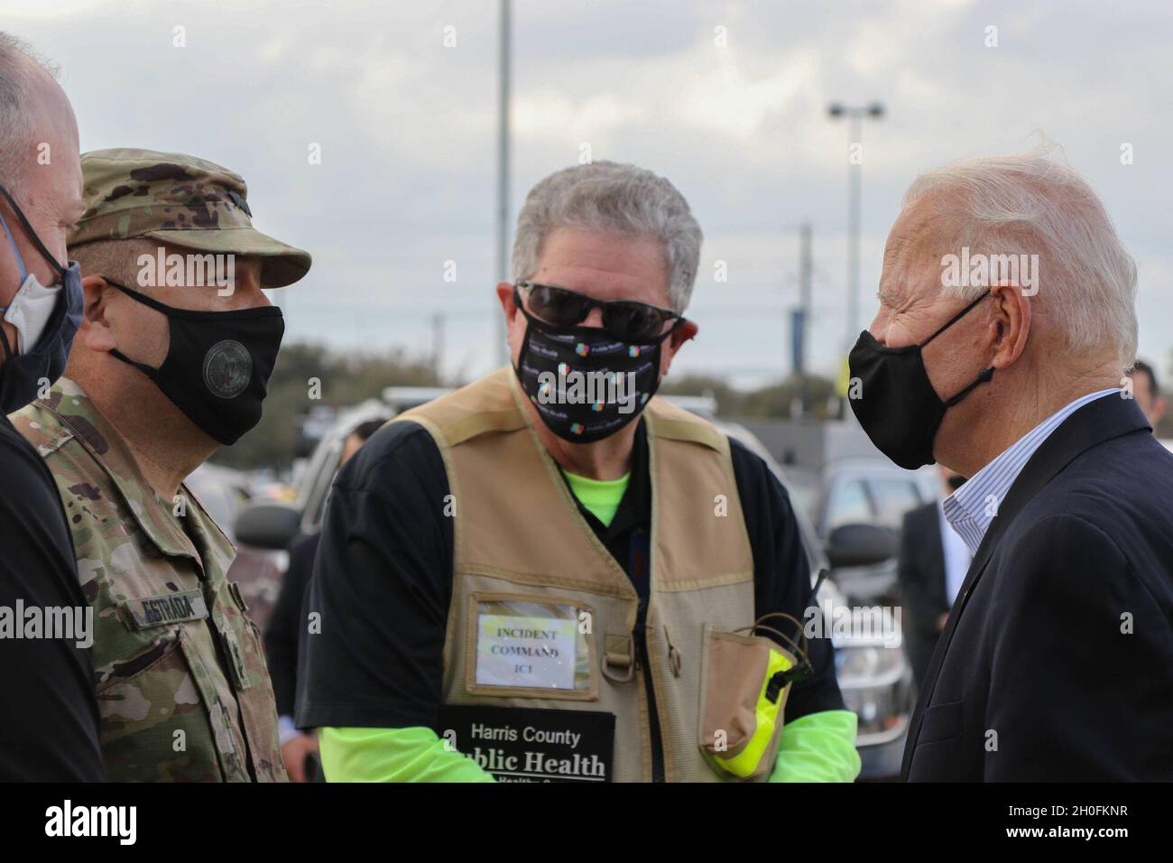 President Joseph Biden receives an update on COVID-19 vaccination operations by U.S. Army Maj. Gen. Pablo Estrada, Commanding General, Task Force 46, during the President’s visit to the state-run, federally-supported COVID-19 Community Vaccination Center at NRG Stadium in Houston, Texas, Feb. 26, 2021.  During his visit, the President met with the Airmen and Soldiers who support Harris County, State of Texas, and Federal Emergency Management Agency efforts to vaccinate the public for COVID-19.  U.S. Northern Command, through U.S. Army North, remains committed to providing continued, flexible D Stock Photo