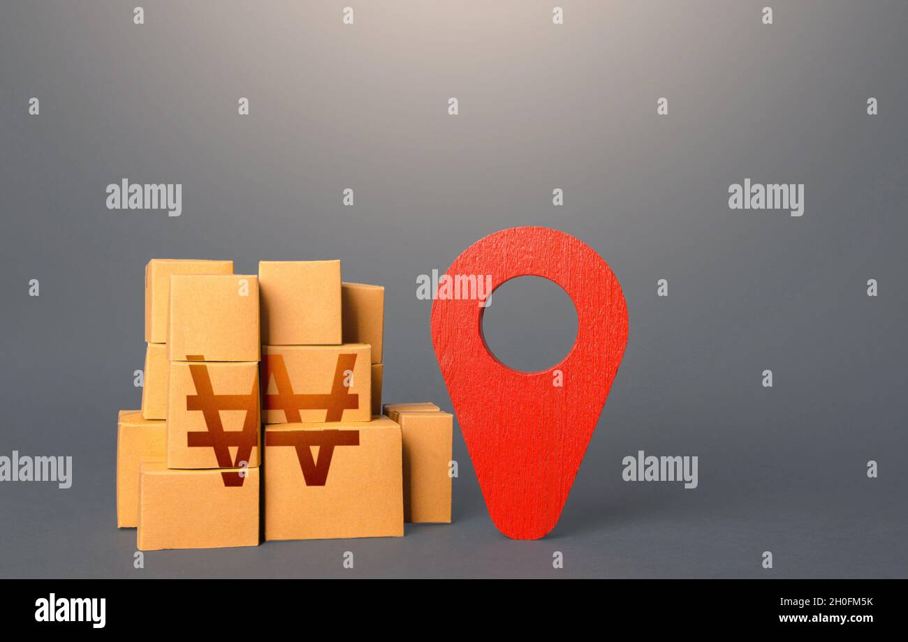 Cardboard boxes with south korean won and red pin location tracking