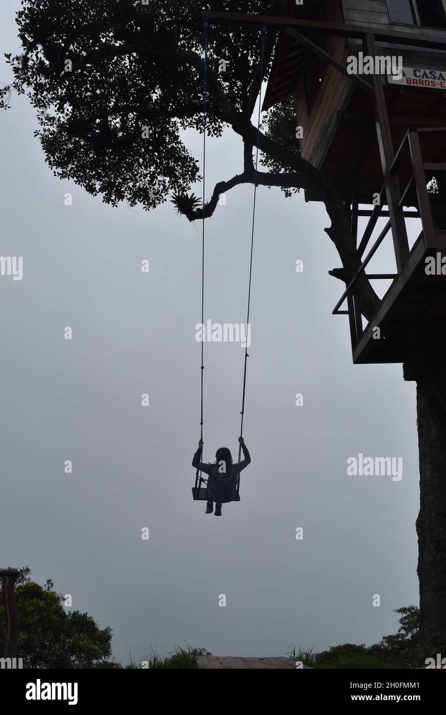 swing at the end of the world, Baños de Agua Santa, Ecuador Stock Photo