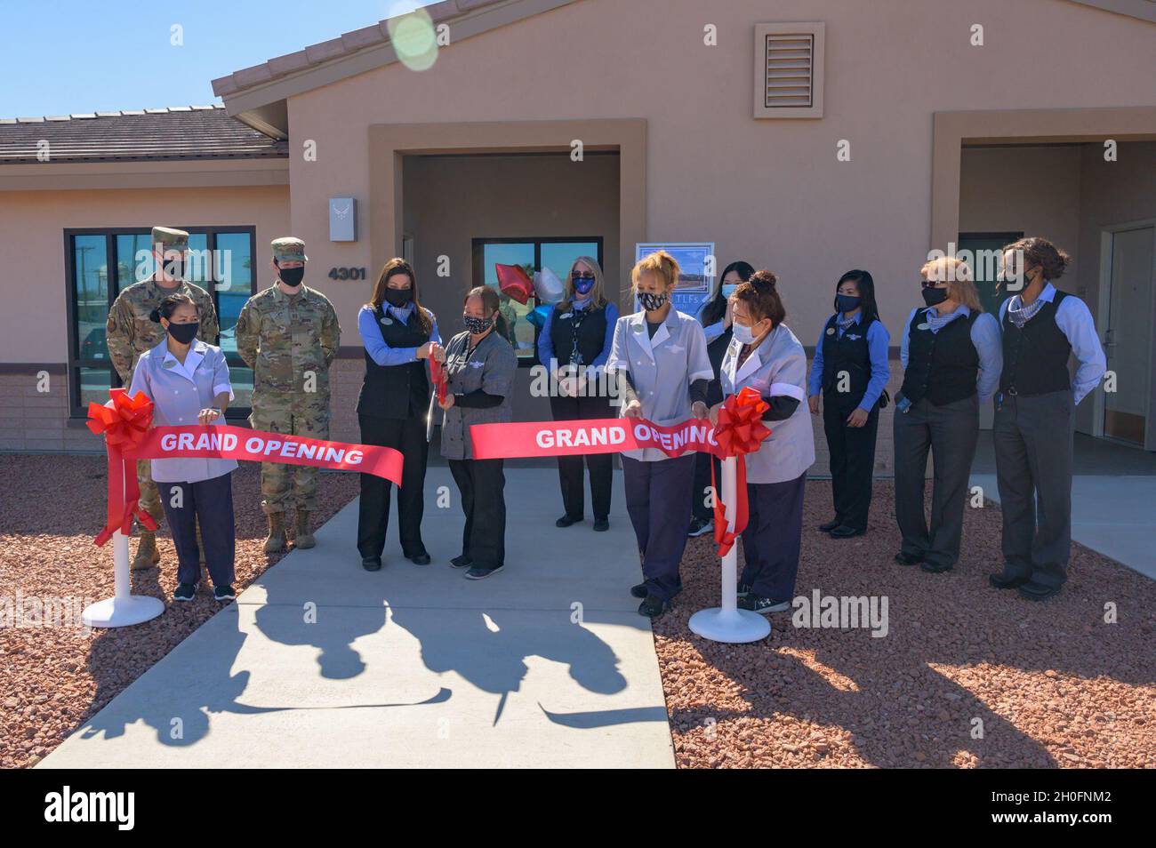 Nellis Temporary Lodging Facility (TLF) staff members and 99th Air Base