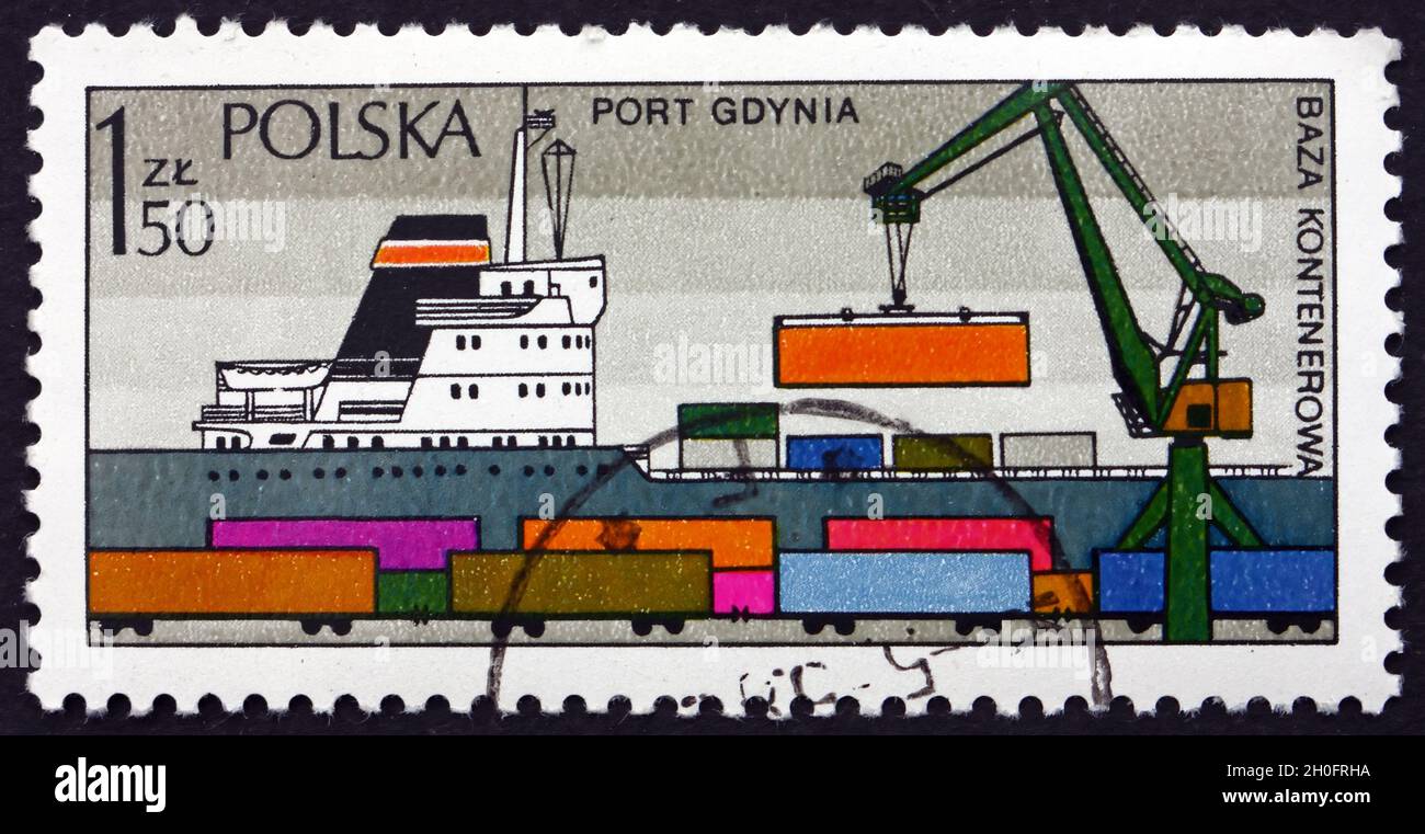 POLAND - CIRCA 1976: a stamp printed in Poland shows Loading Containers, Gdynia, Polish Port, circa 1976 Stock Photo