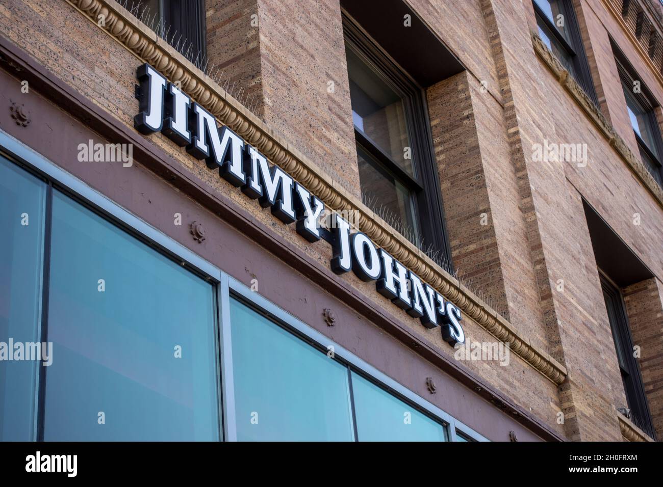 Tacoma, WA USA - circa August 2021: Low angle view of a Jimmy John's sandwich shop in downtown Tacoma. Stock Photo