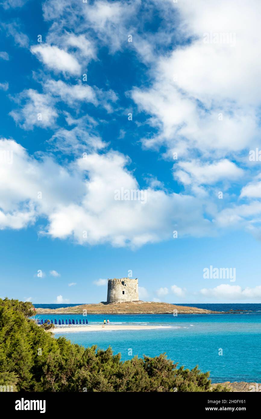 Stunning landscape with the Aragonese Tower and La Pelosa Beach bathed by a calm turquoise water. Spiaggia La Pelosa, Stintino, north-west Sardinia. Stock Photo