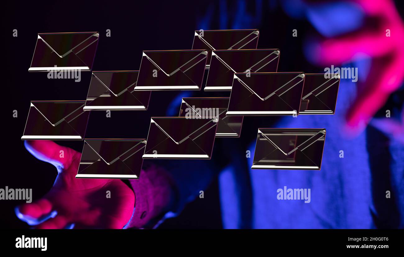3D rendering of email icons floating on a man's hand against a dark ...