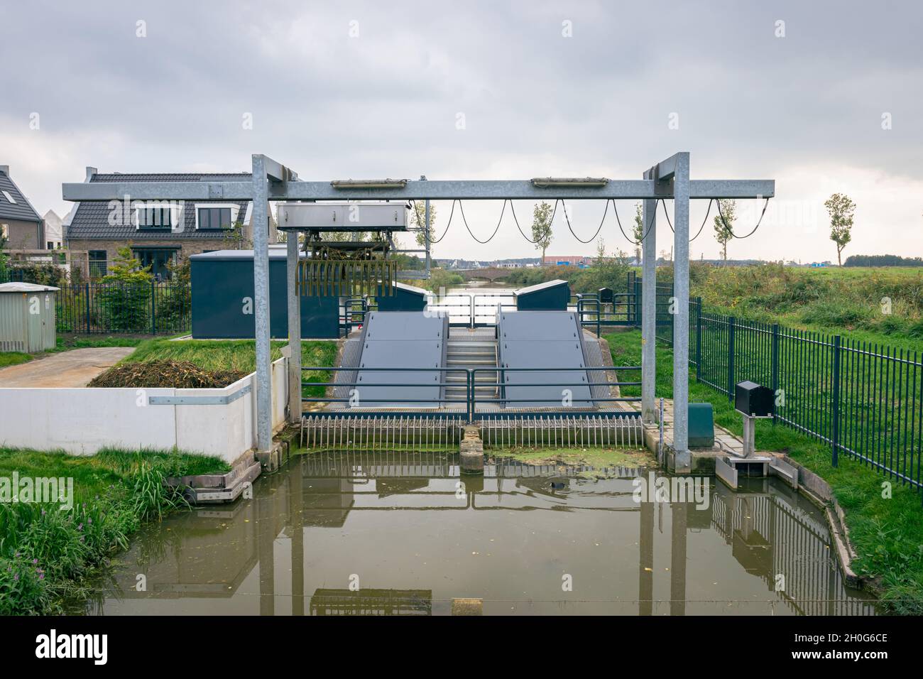 Small pumping station along a canal in Holland. The station pumps the