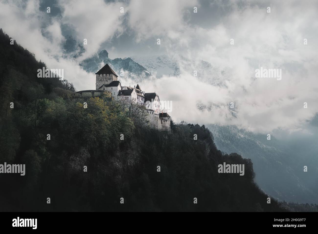 Vaduz Castle and Mountains - Vaduz, Liechtenstein Stock Photo