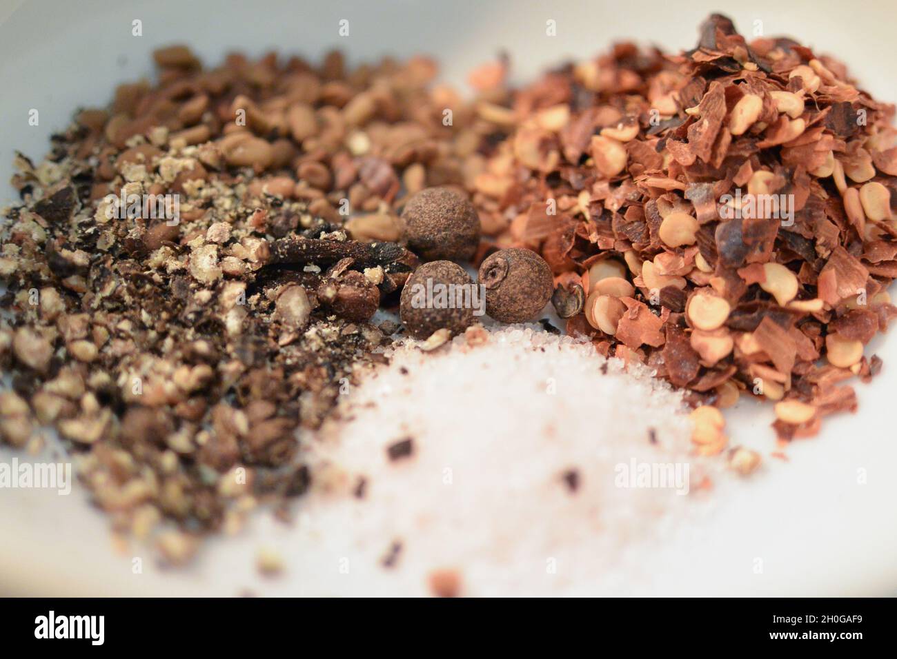 Toasted whole spices (chilli flakes, allspice berries, cloves