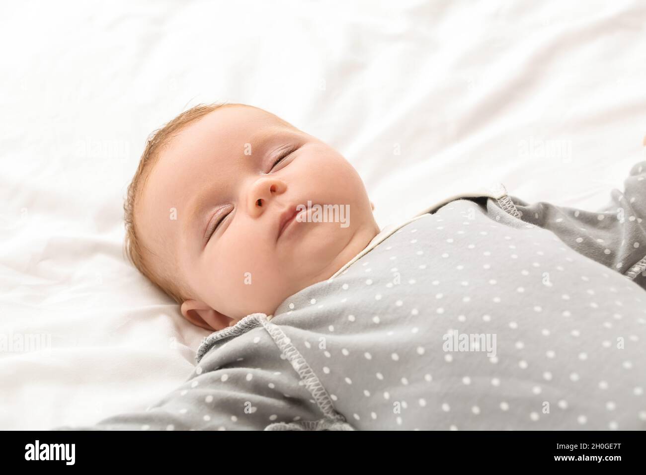 Little baby sleeping on bed Stock Photo Alamy