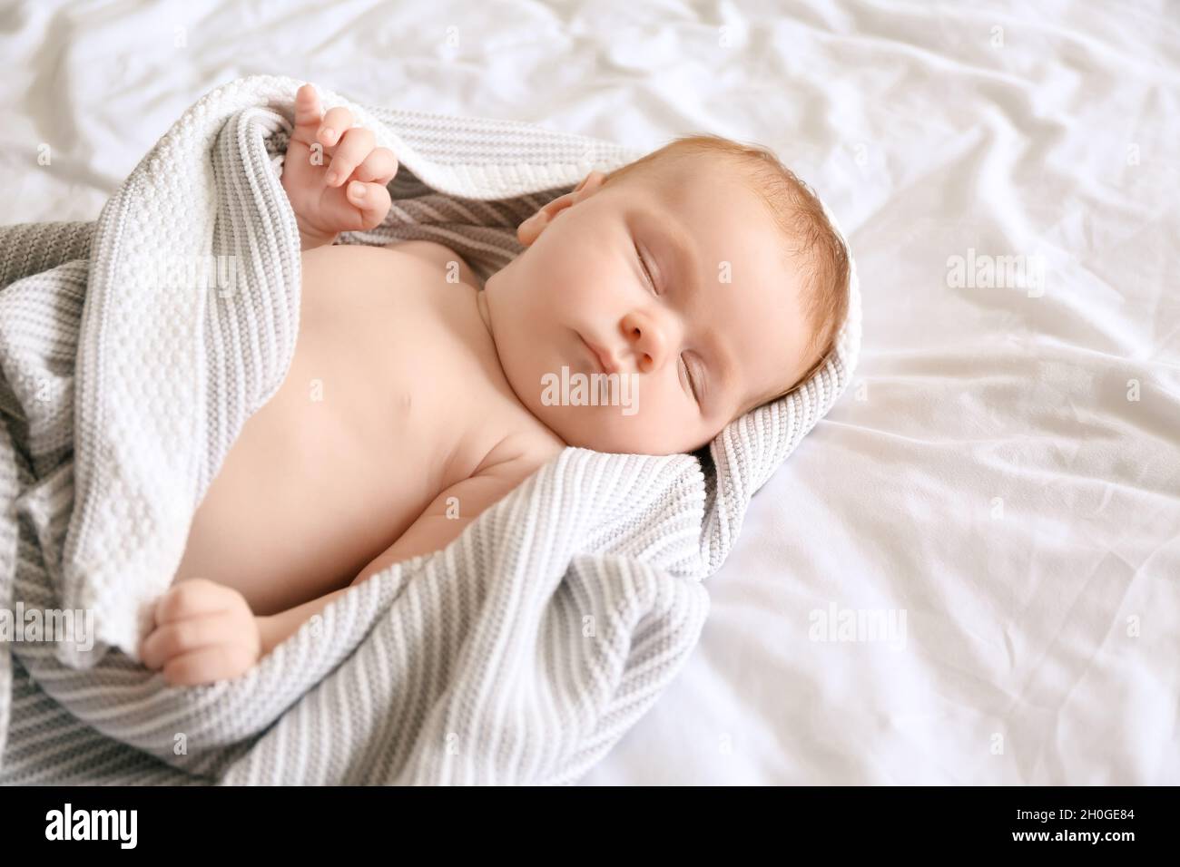 Little baby sleeping on bed Stock Photo Alamy