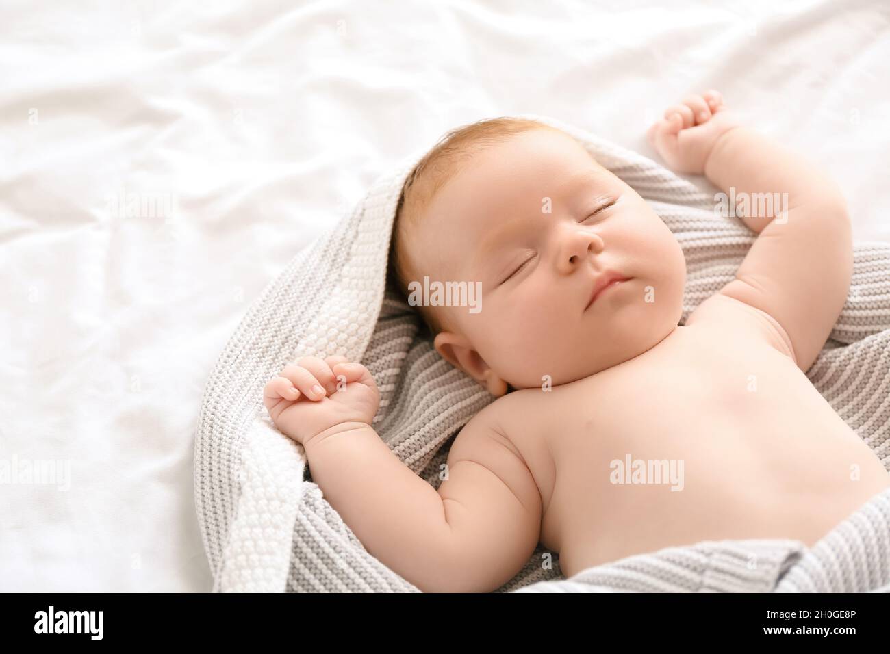 Little baby sleeping on bed Stock Photo Alamy