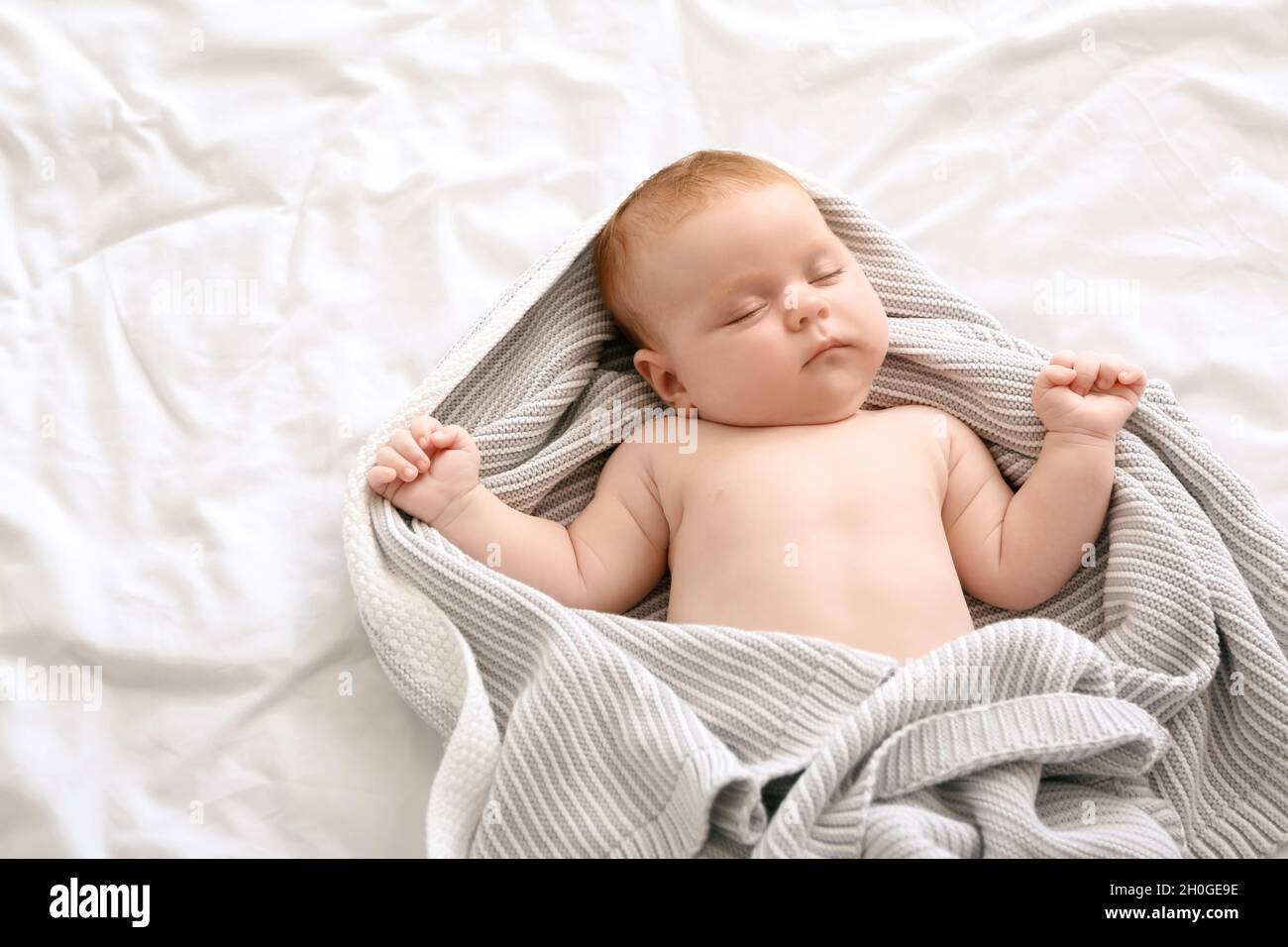 Little baby sleeping on bed Stock Photo Alamy