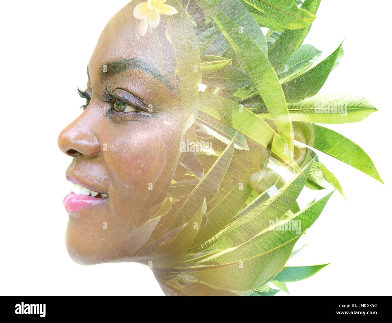 A double exposure portrait of a female model combined with an image of ...