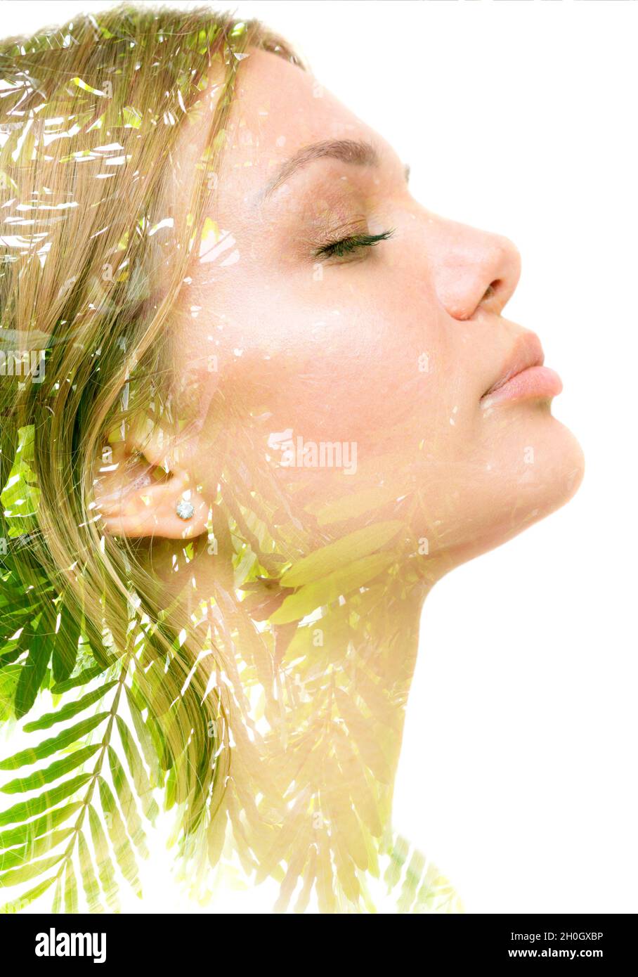 Double exposure portrait of a young woman enjoying nature Stock Photo ...