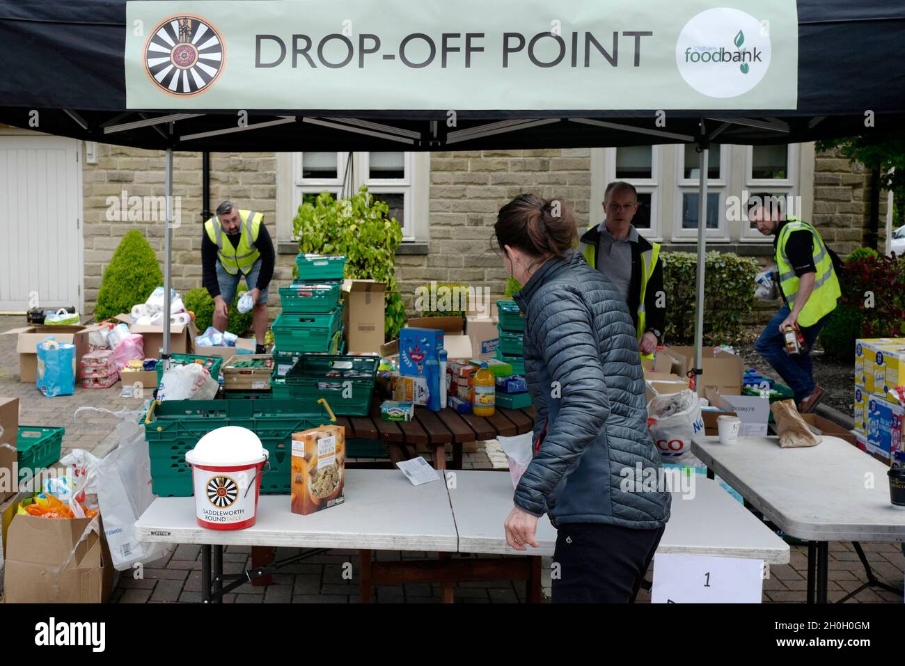 Volunteers from Saddleworth Round Table operate a food drop to support local food banks in Saddleworth, Greater Manchester Stock Photo