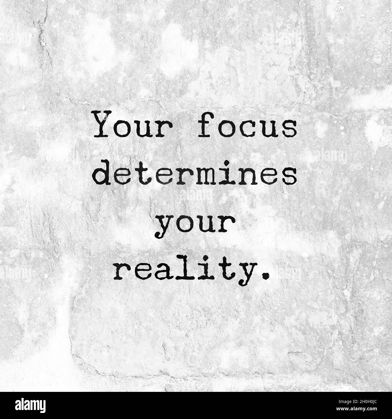 Quote. your focus determines your reality. Stock Photo