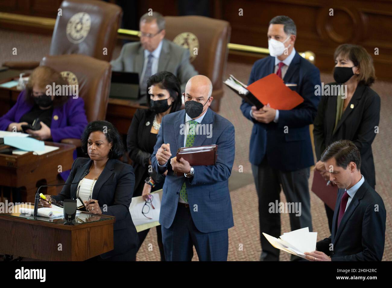 Austin Texas USA, October 12, 2021: State Rep. NICOLE COLLIER, D-Fort Worth, speaks at the back mic while other representatives wait their turn as the Texas House considers HB1, the redistricting bill, during the third-called 87th Legislature special session. Credit: Bob Daemmrich/Alamy Live News Stock Photo