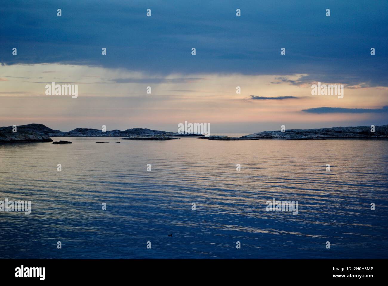 Moments after sunset in Fjällbacka archipelago on the Swedish west coast Stock Photo