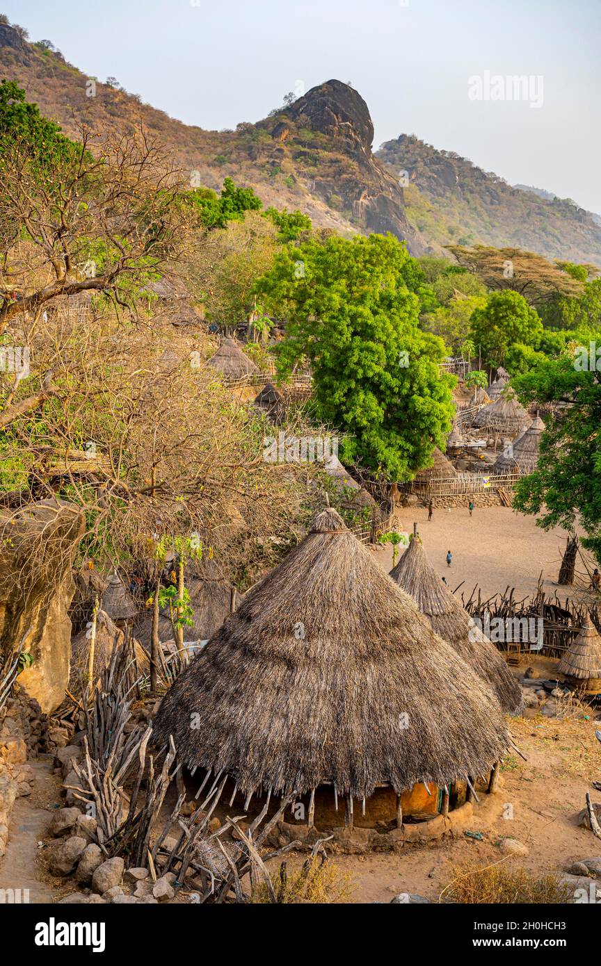Tradtional build huts of the Otuho or Lutoko tribe in a village in the Imatong mountains, Eastern Equatoria, South Sudan Stock Photo