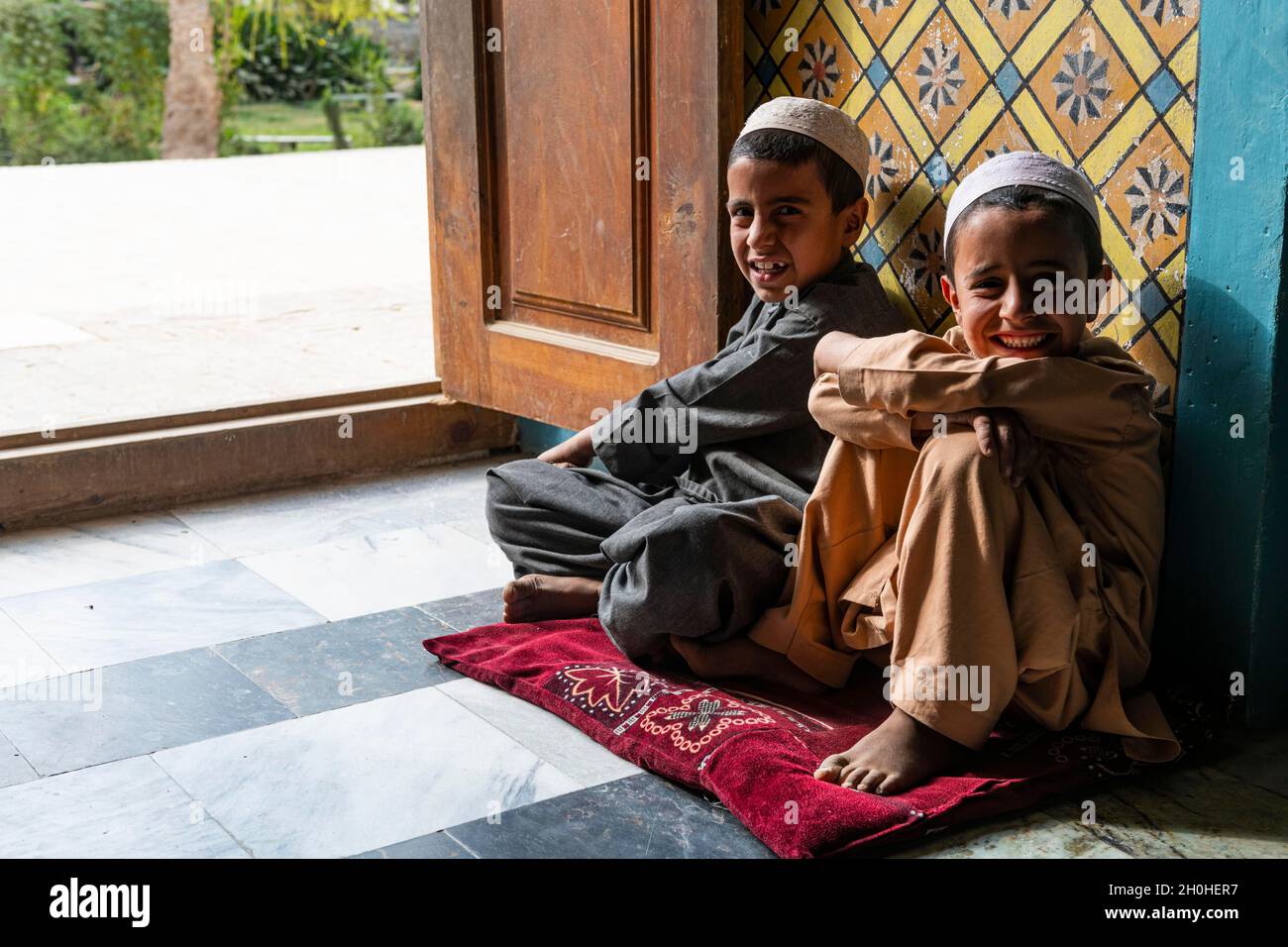 Young students in the Mausoleum of Mirwais Khan Hotaki, Kandahar, Afghanistan Stock Photo