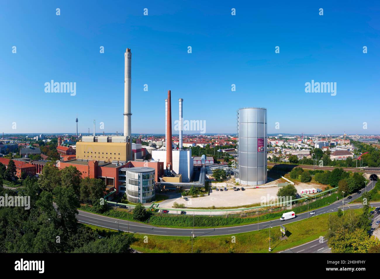 Aerial view, N-NERGIE Netz GmbH premises, on the left district heating power plant, on the right heat storage tank with 33, 000 cubic metres of Stock Photo
