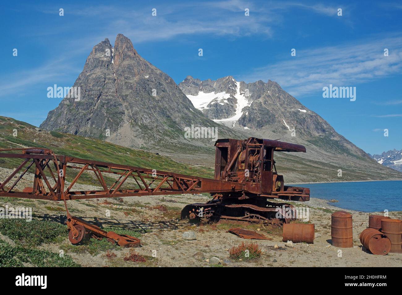 Rusted army vehicles and barrels from 1947, Ikateq army base, Greenland, North America, Denmark Stock Photo