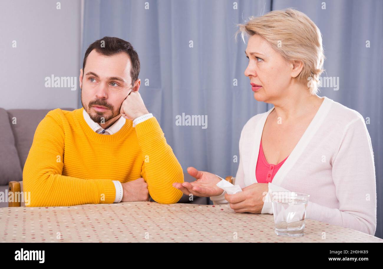 Mother advising her son hi-res stock photography and images - Alamy