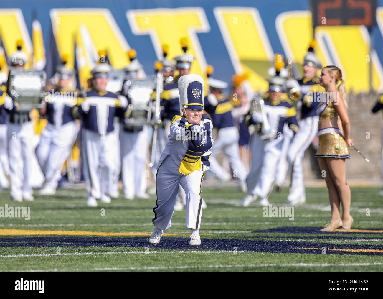 Toledo, OH, USA. 9th Oct, 2021. The Toledo drum major leads the Toledo Marching Band onto the field prior to the NCAA football game between the Toledo Rockets and the Northern Illinois Huskies at the Glass Bowl in Toledo, OH. Kyle Okita/CSM/Alamy Live News Stock Photo