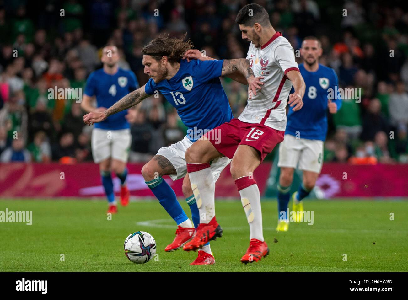 Dublin, Ireland. 12th Oct, 2021. Jeff HENDRICK of Ireland and Karim BOUDIAF of Qatar during the 2022 FIFA World Cup Preparation match between Republic of Ireland and Qatar at Aviva Stadium in Dublin, Ireland on October 12, 2021 (Photo by Andrew SURMA/ Credit: Sipa USA/Alamy Live News Stock Photo