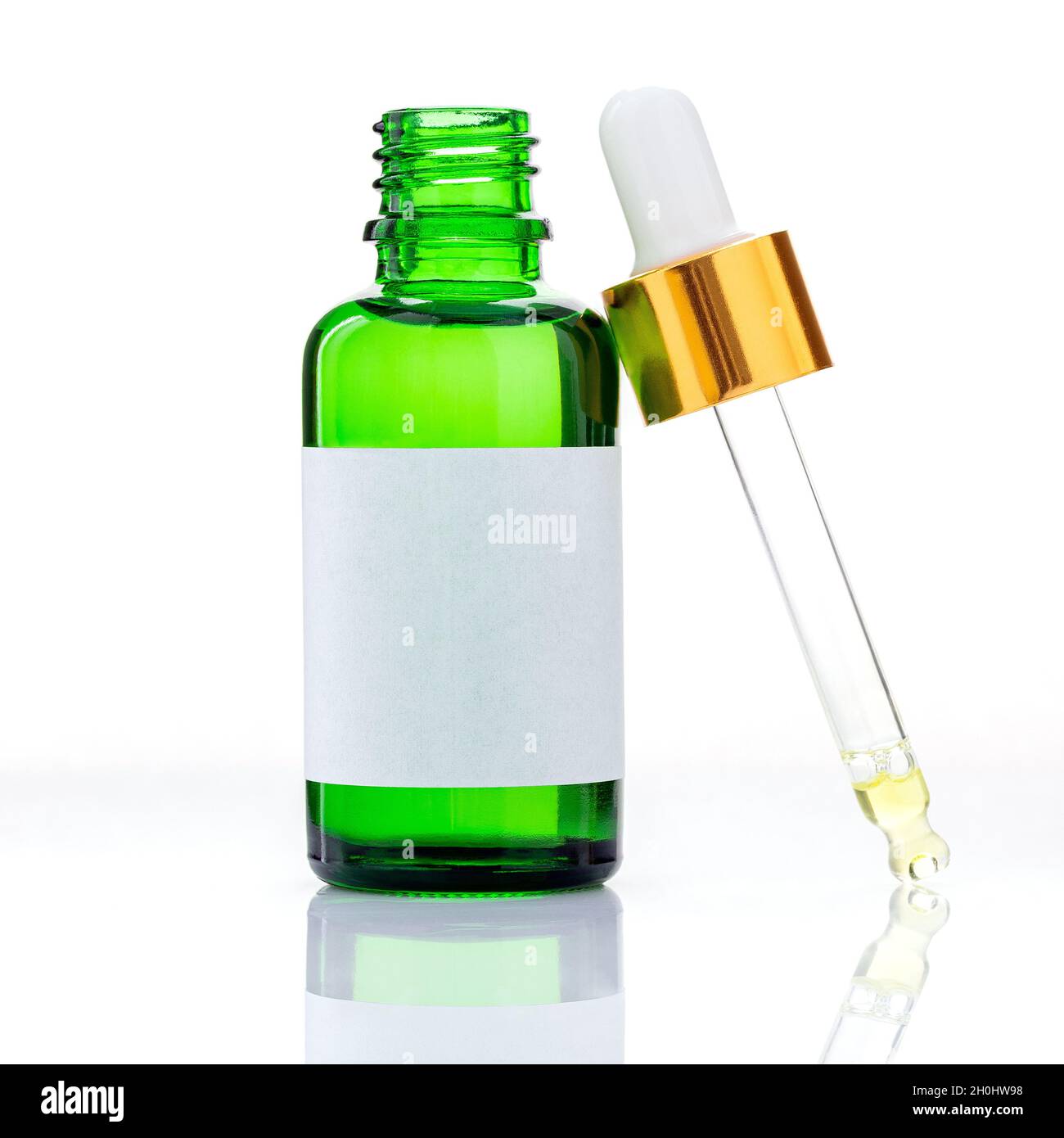 Essential oil bottles with dropper and bubble isolated on white background Stock Photo Alamy