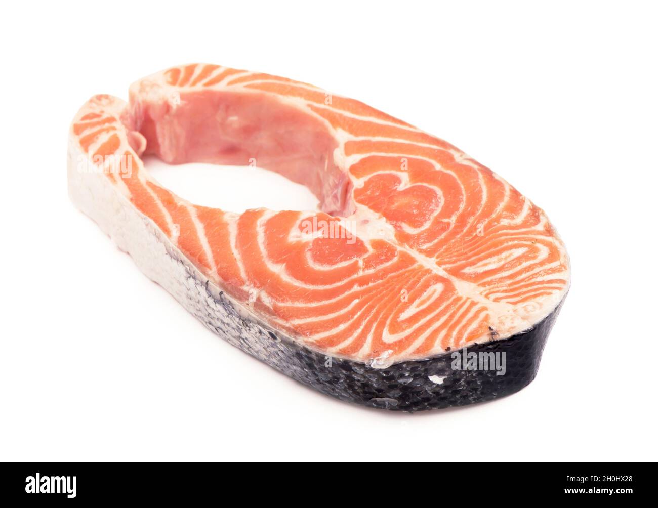 Steak of red fish on white background Stock Photo - Alamy