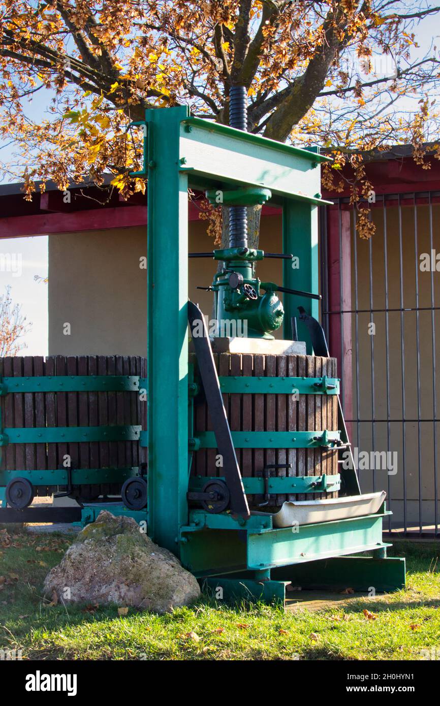Large wine press used to extract juice from crushed grapes to make wine