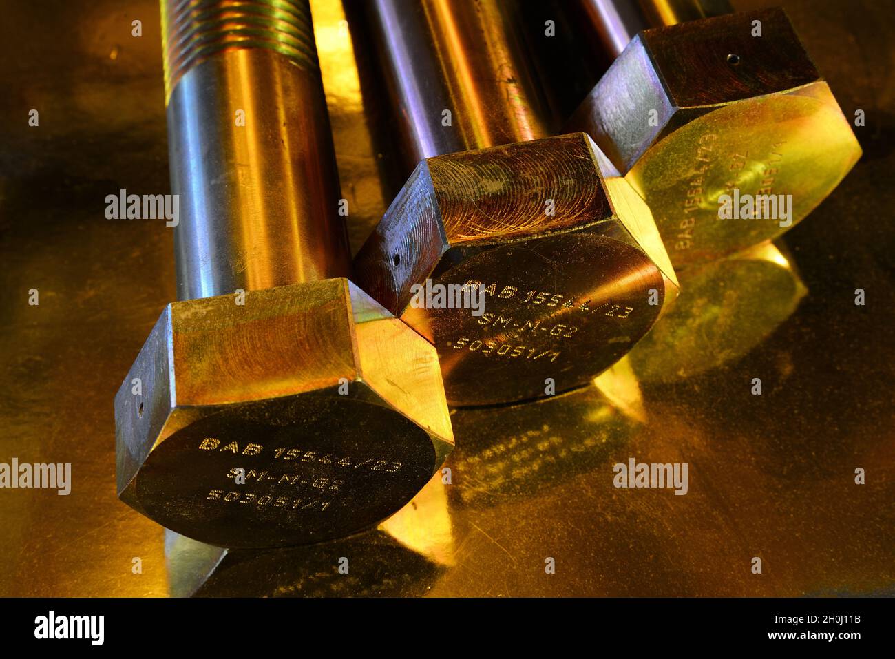 Large brass plated bolts Stock Photo Alamy