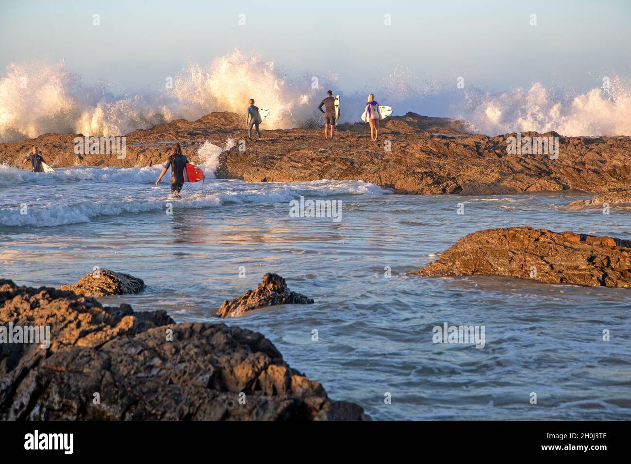 Surfers at Snapper Rocks, Coolangatta Stock Photo