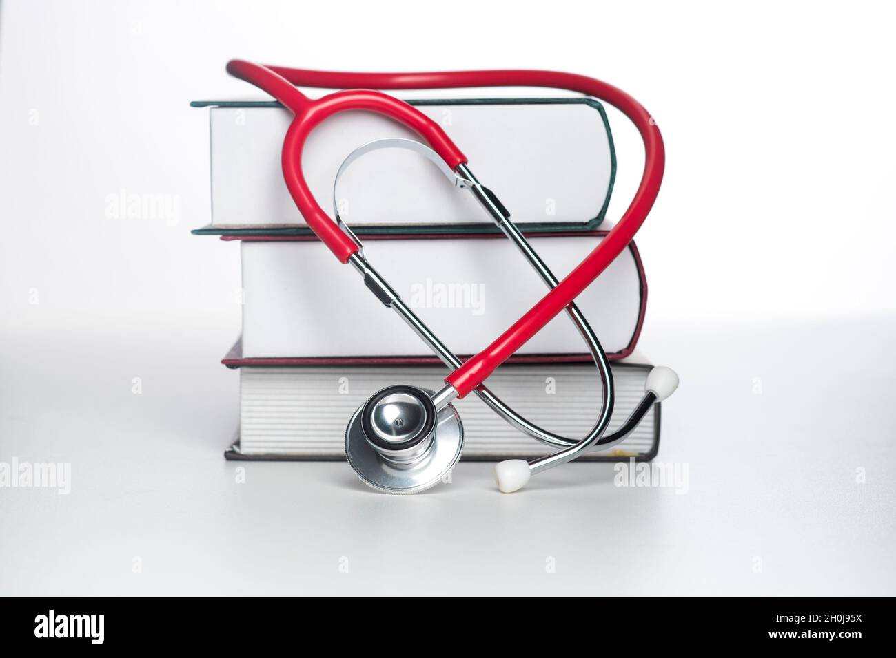Concept of medical education with book and stethoscope Stock Photo - Alamy