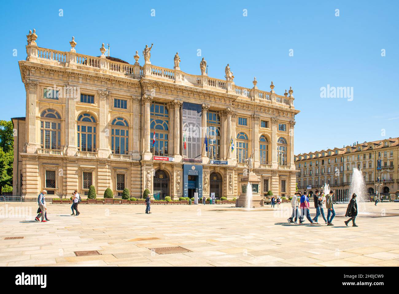 Turin, Italy. May 12th, 2021. View of Piazza Castello with the facade of the building that houses the Museum of Ancient Art. Some people walk in the s Stock Photo