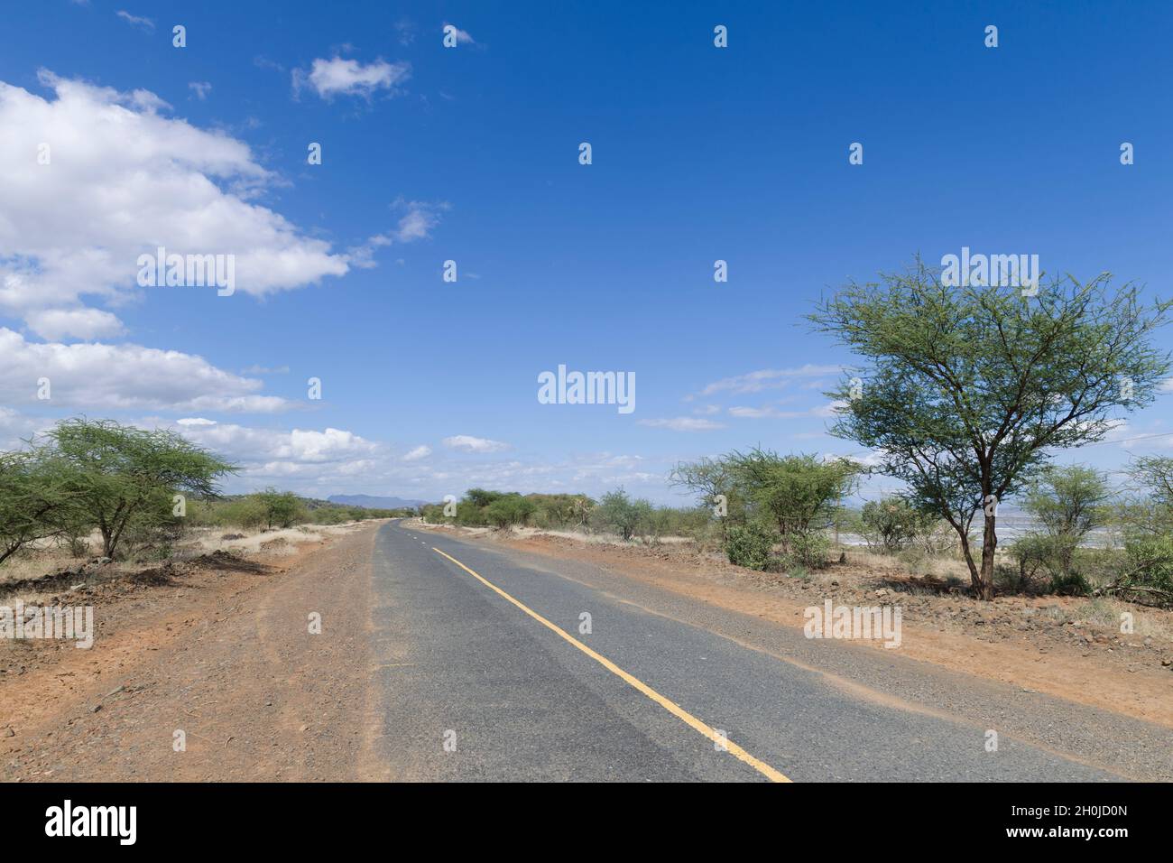 A view of the Magadi road C58 which which goes to Lake Magadi. Magadi Road, Kajiado county, Kenya.  10 Jun 2021 Stock Photo