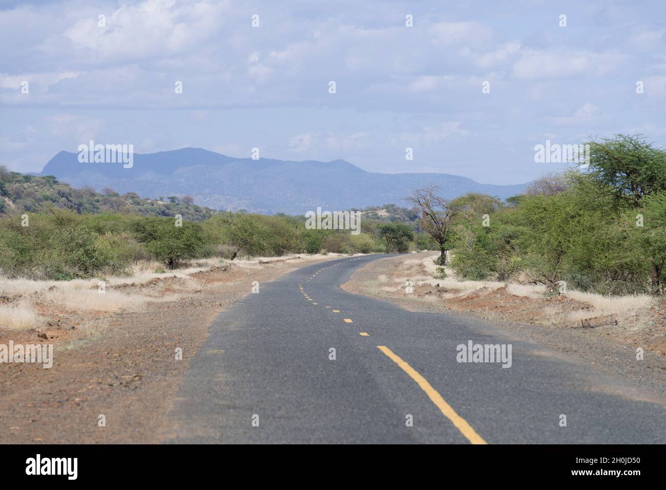 A view of the Magadi road C58 which which goes to Lake Magadi. Magadi Road, Kajiado county, Kenya.  10 Jun 2021 Stock Photo