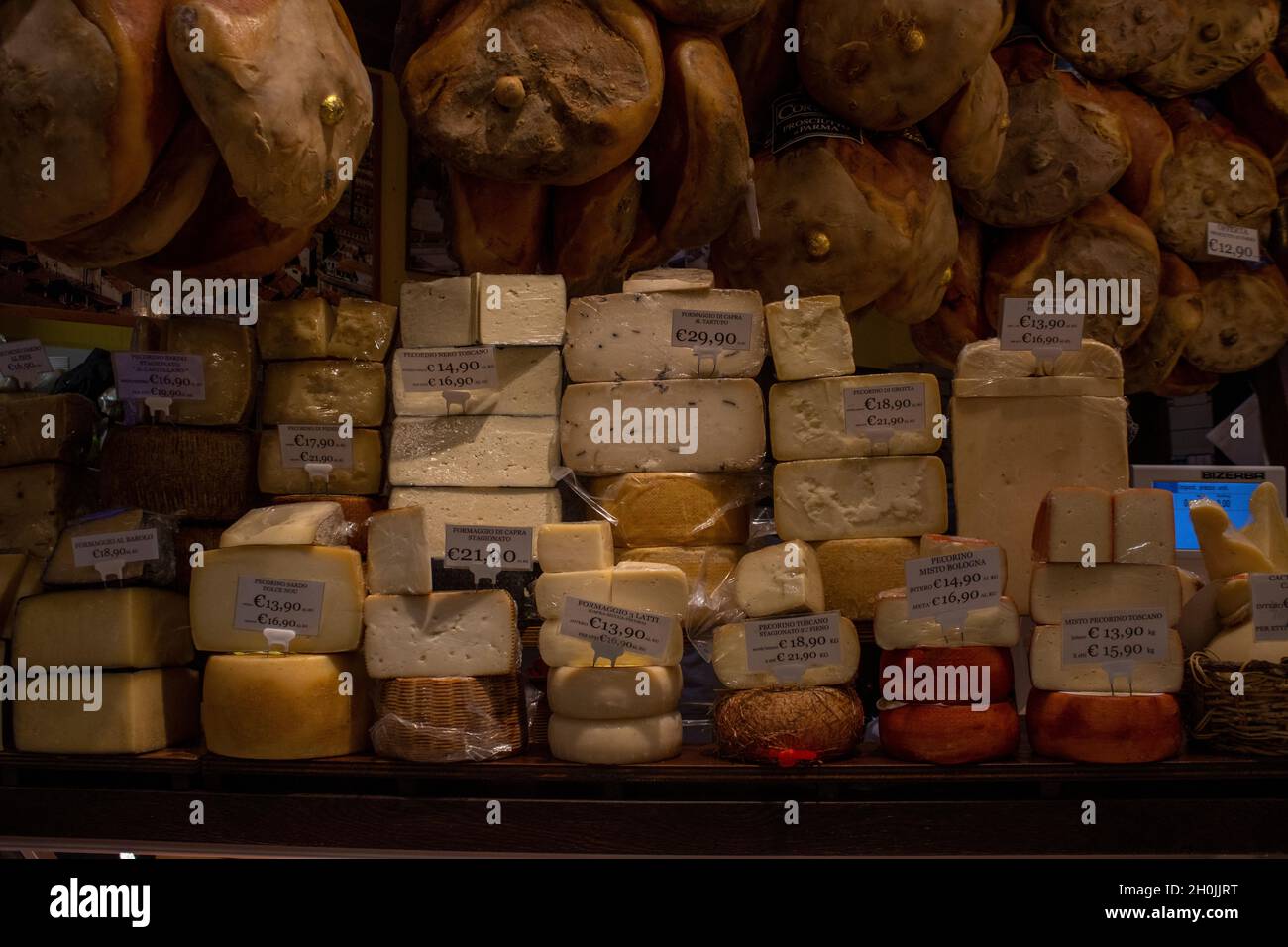 An Italian delicatessen shop window full of food specialities from Bologna Stock Photo Alamy