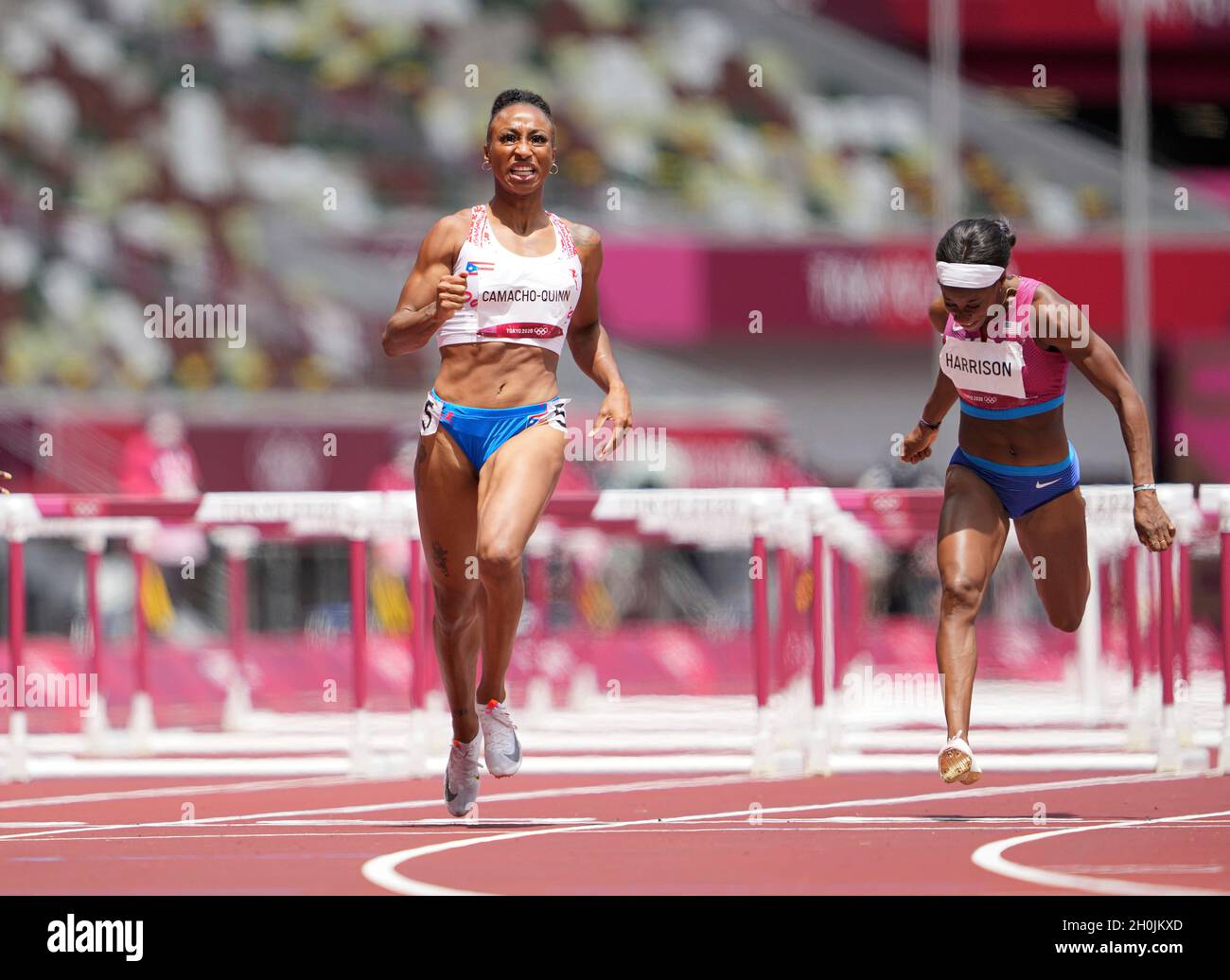Jasmine CamachoQuinn running and winning in the final of the 100 meter hurdles at the 2020
