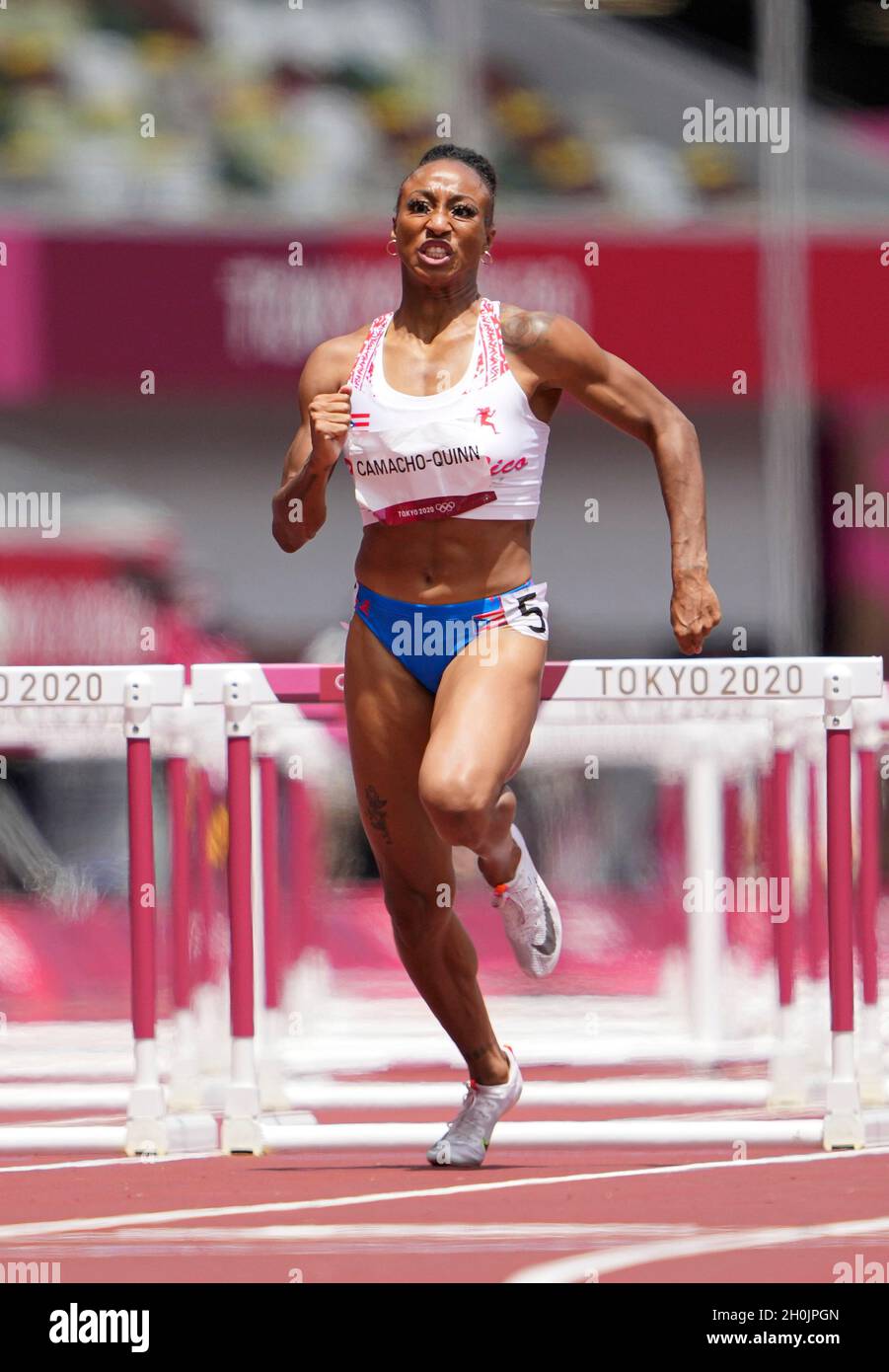 Jasmine CamachoQuinn running and winning in the final of the 100 meter hurdles at the 2020