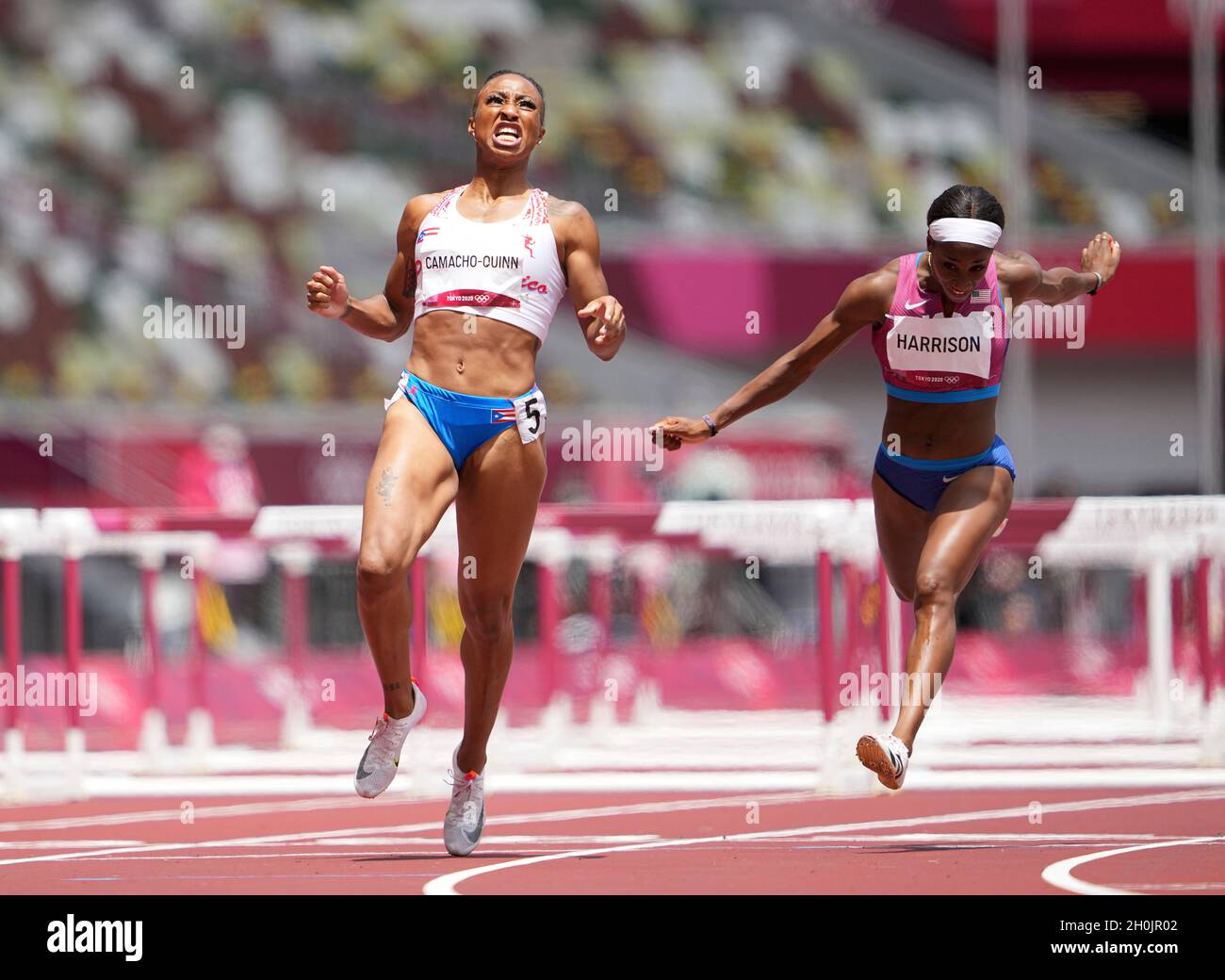 Jasmine CamachoQuinn running and winning in the final of the 100 meter hurdles at the 2020