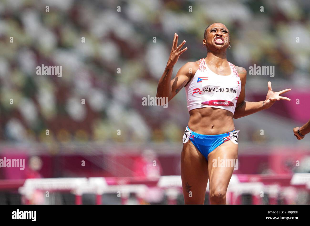 Jasmine CamachoQuinn running and winning in the final of the 100 meter hurdles at the 2020