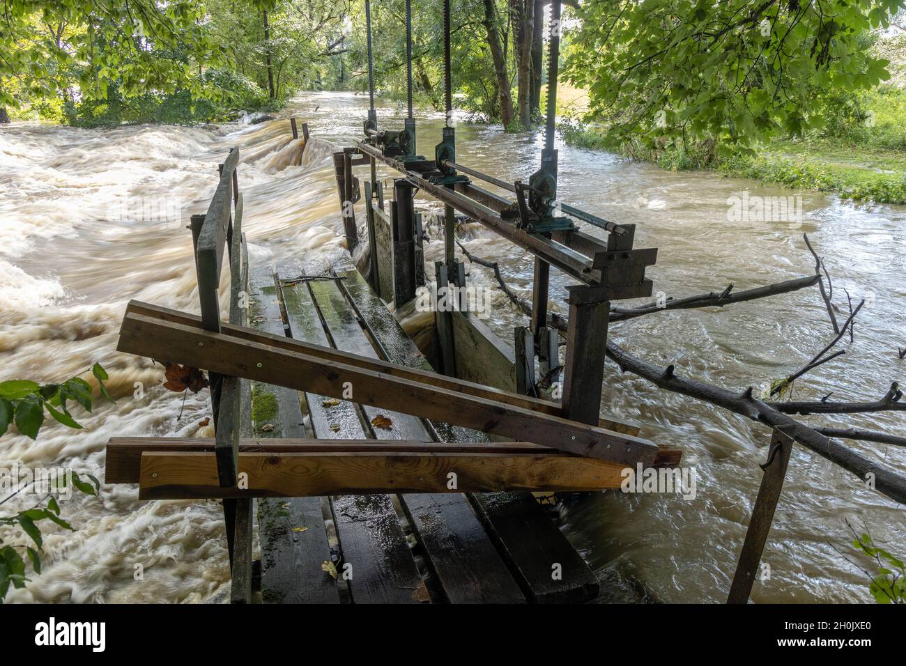 flooded weir after heavy rain, climate change, Germany, Bavaria, Isental, Dorfen Stock Photo